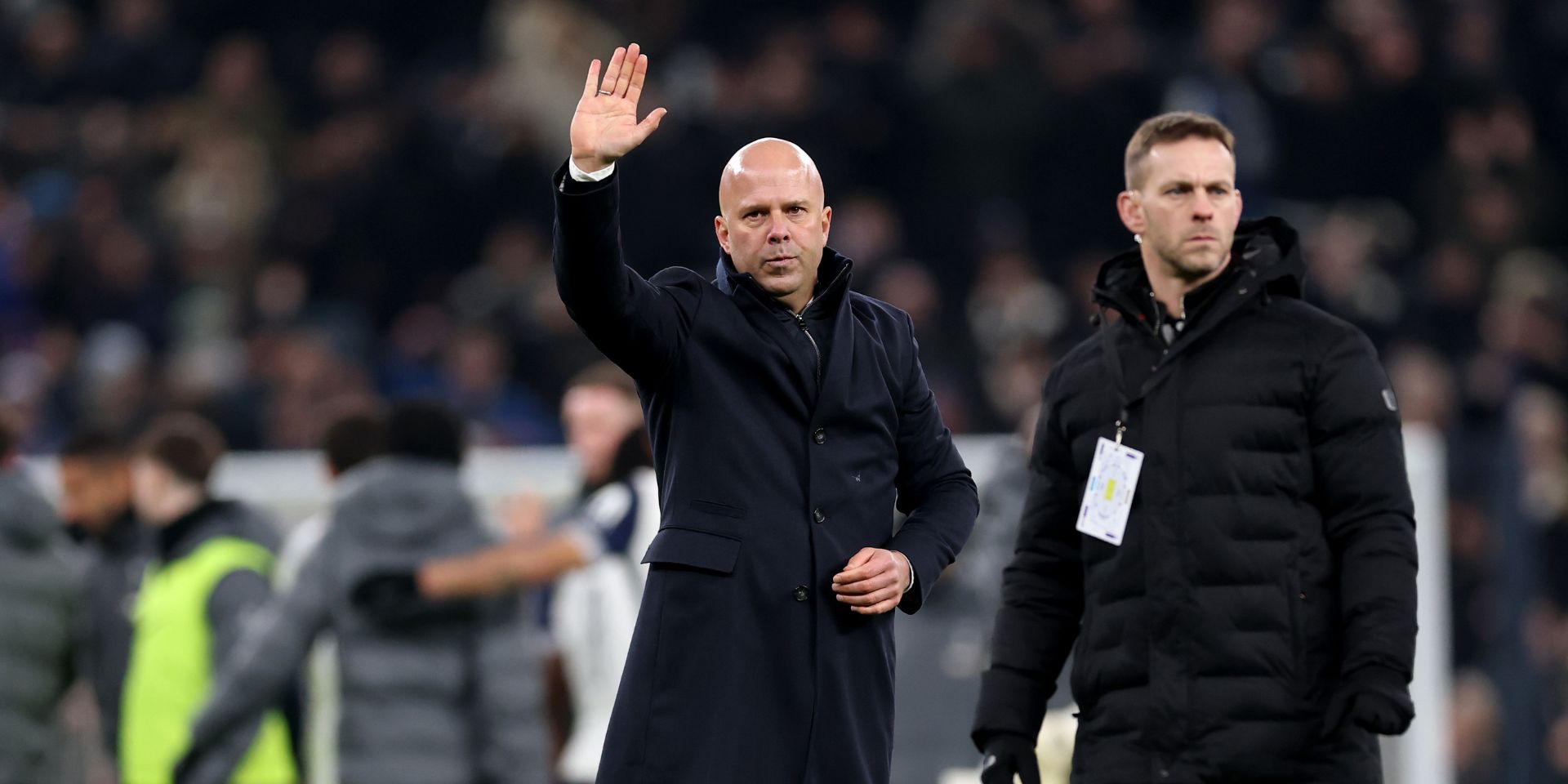Arne Slot waves to Liverpool fans
