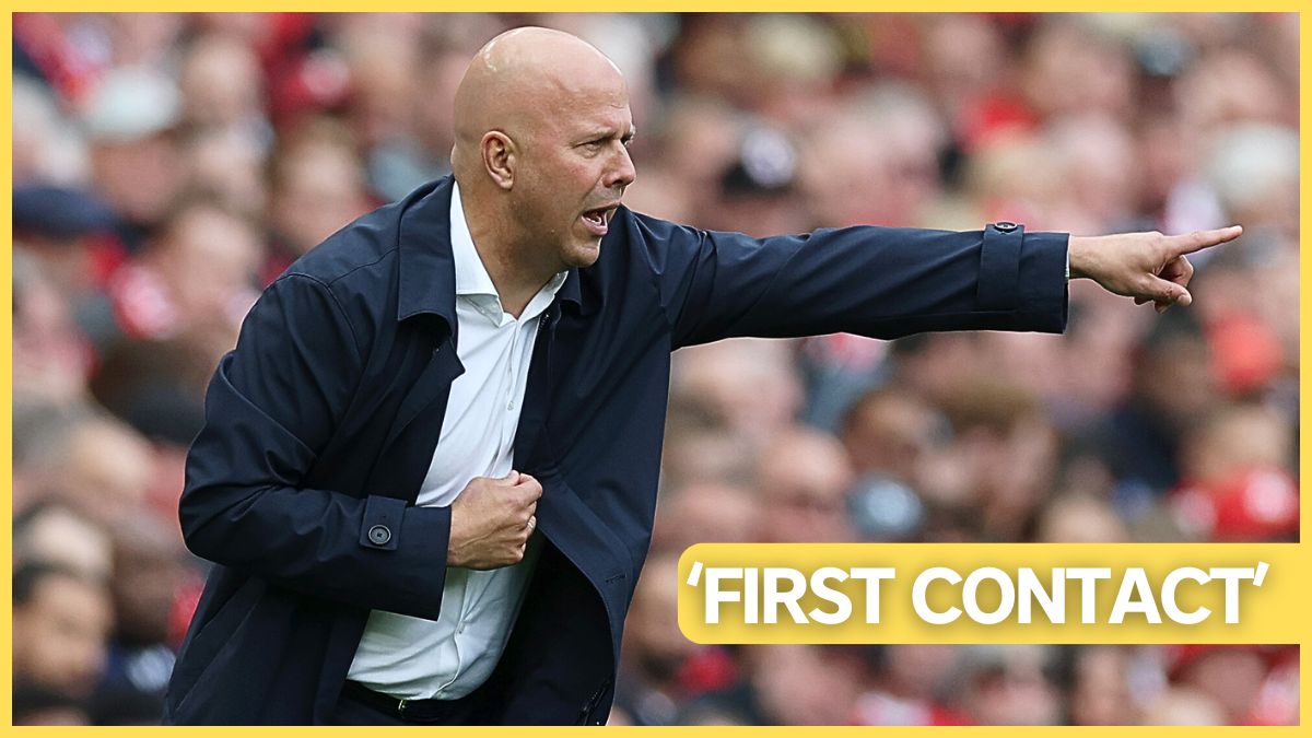 Liverpool head coach Arne Slot points at the pitch.