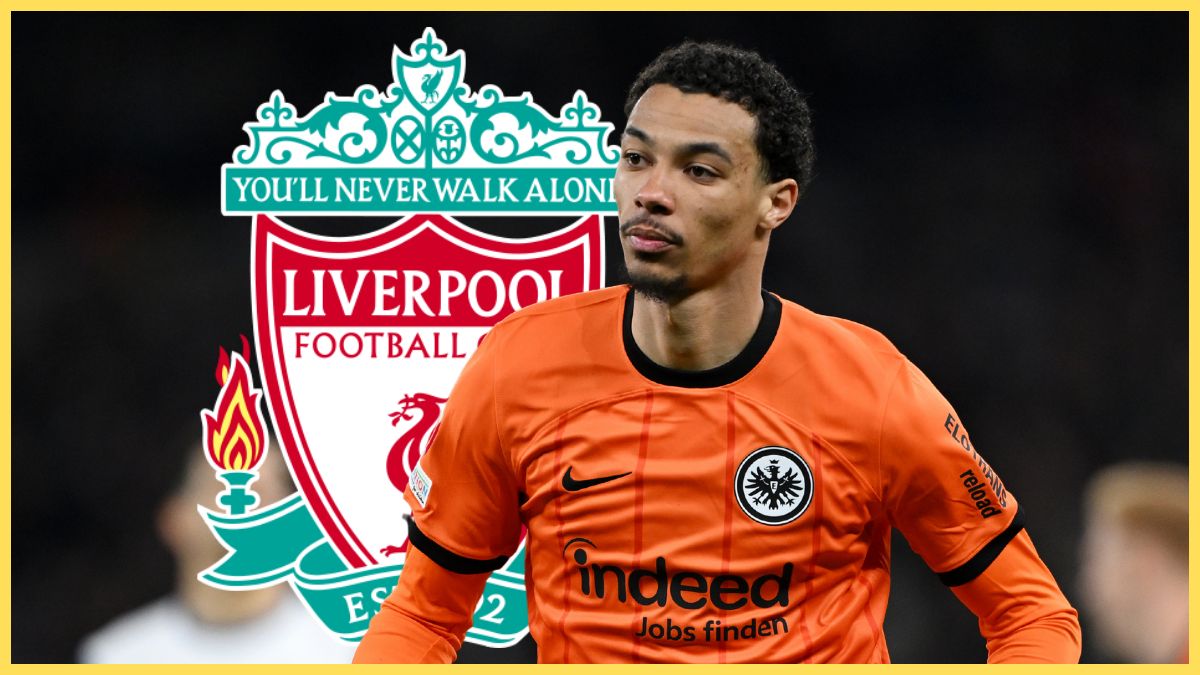 Hugo Ekitike runs on the pitch in front of Liverpool club crest.