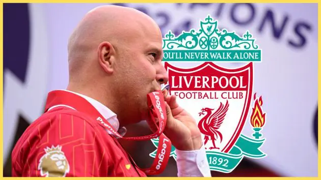 Arne Slot kisses his Premier League winners medal in front of Liverpool club crest.