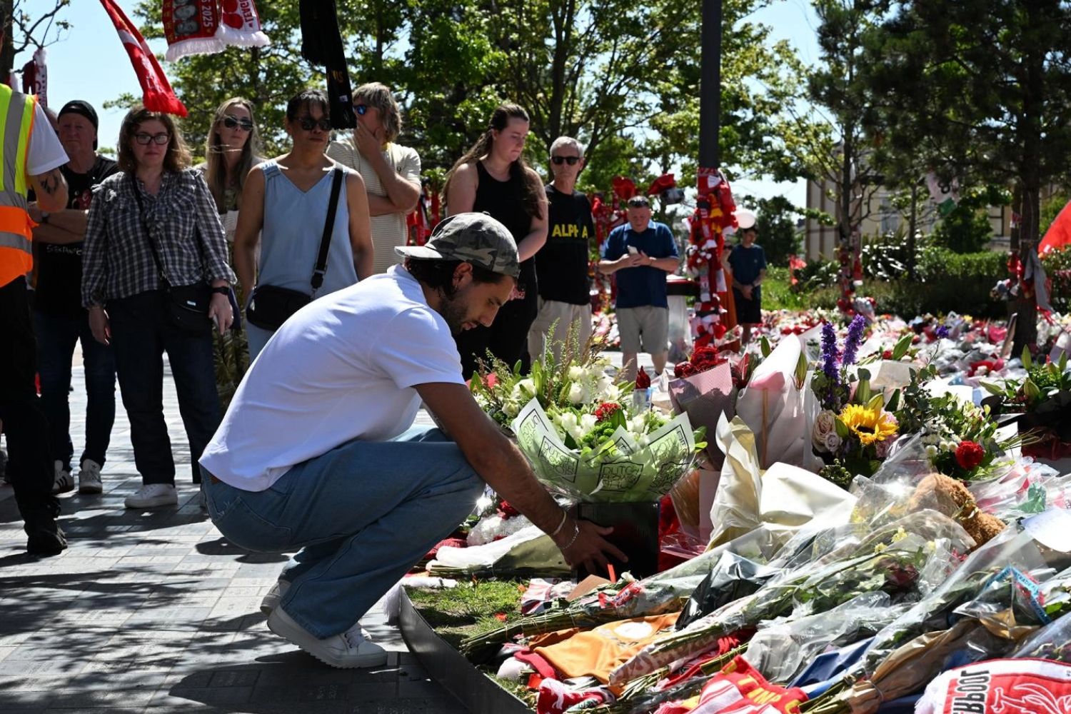 Dominik Szoboszlai lays flowers at Anfield in tribute to Diogo Jota