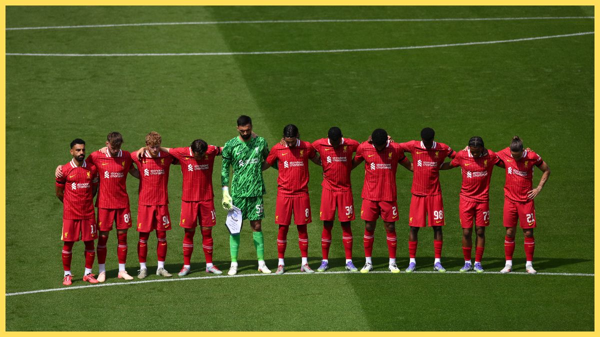 Liverpool players line up on centre circle at Deepdale.