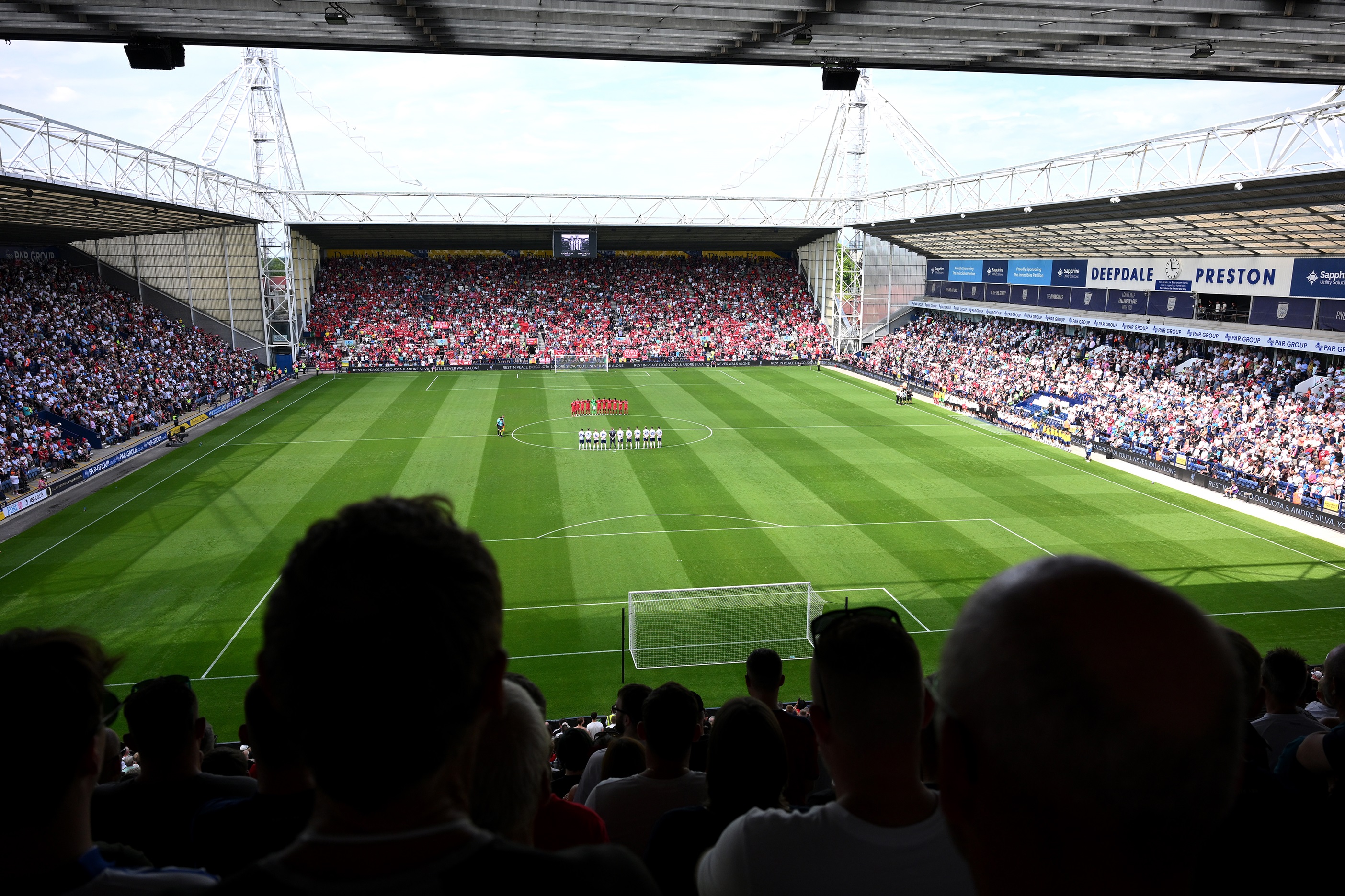 Fans view of Deepdale stadium as Liverpool and Preston players gather at the centre circle.