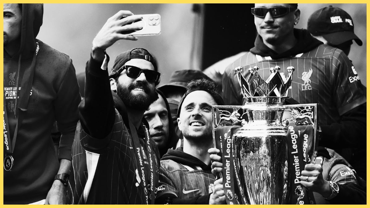Diogo Jota and Alisson Becker during the title parade