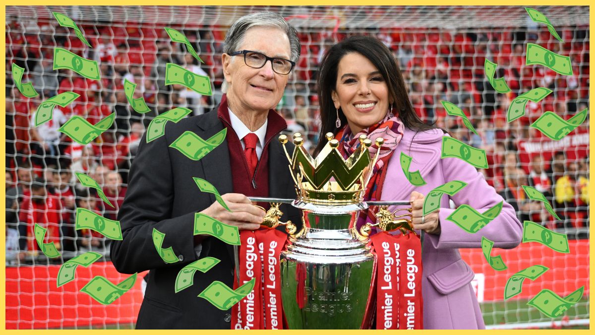 John Henry and Linda Pizzuti Henry pose with the Premier League trophy