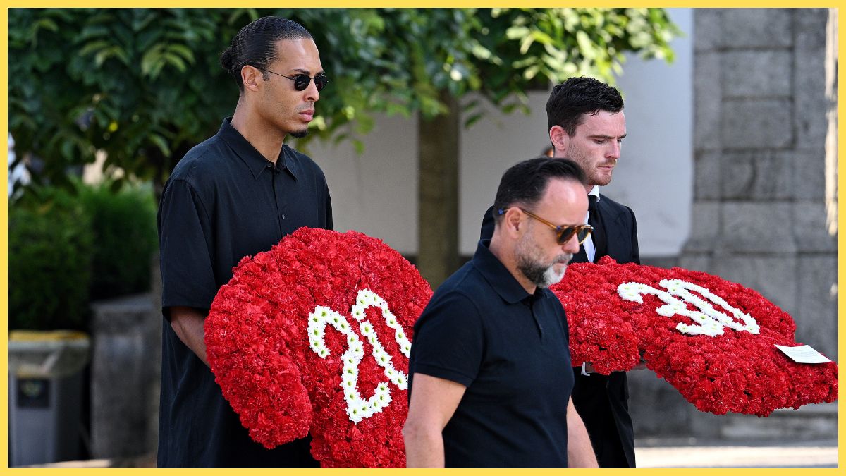 Virgil van Dijk and Andy Robertson carry floral tributes for Diogo Jota