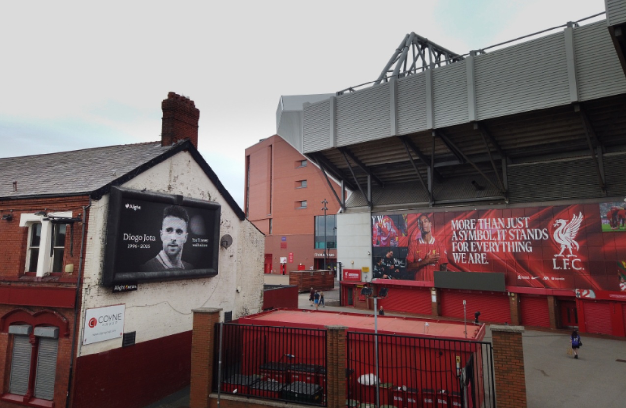 A billboard outside Anfield pays tribute to Diogo Jota