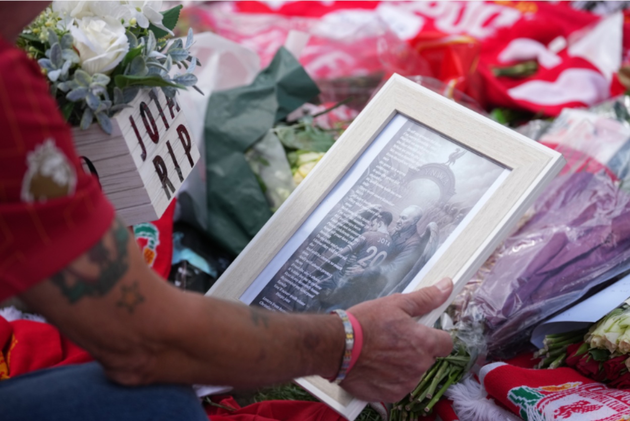 Hundreds of tributes have been laid outside Anfield in memory of Diogo Jota