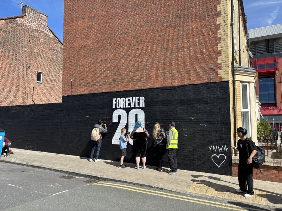 A wall of condolences in memory of Diogo Jota is taking shape near Anfield
