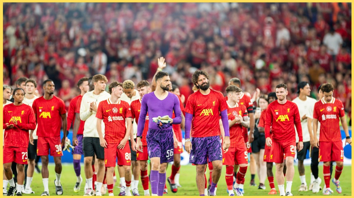Liverpool players salute their fans after the friendly against AC Milan