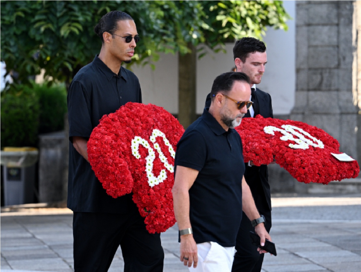 Virgil van Dijk and Andrew Robertson carry floral tributes at the funeral of Liverpool teammate Diogo Jota