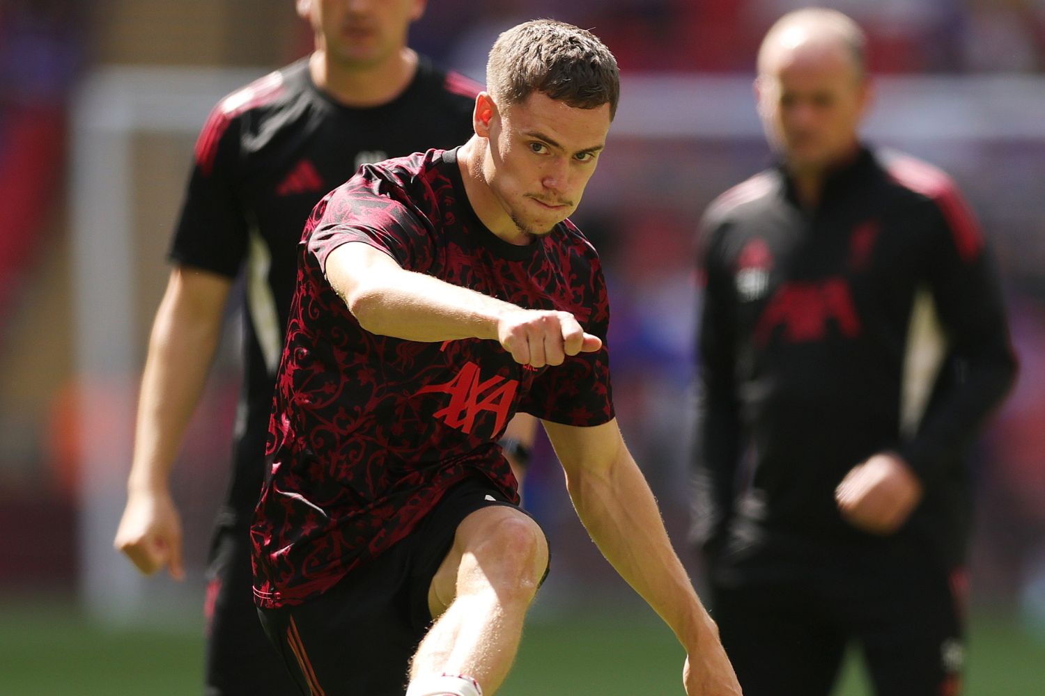 Florian Wirtz warms up at Wembley