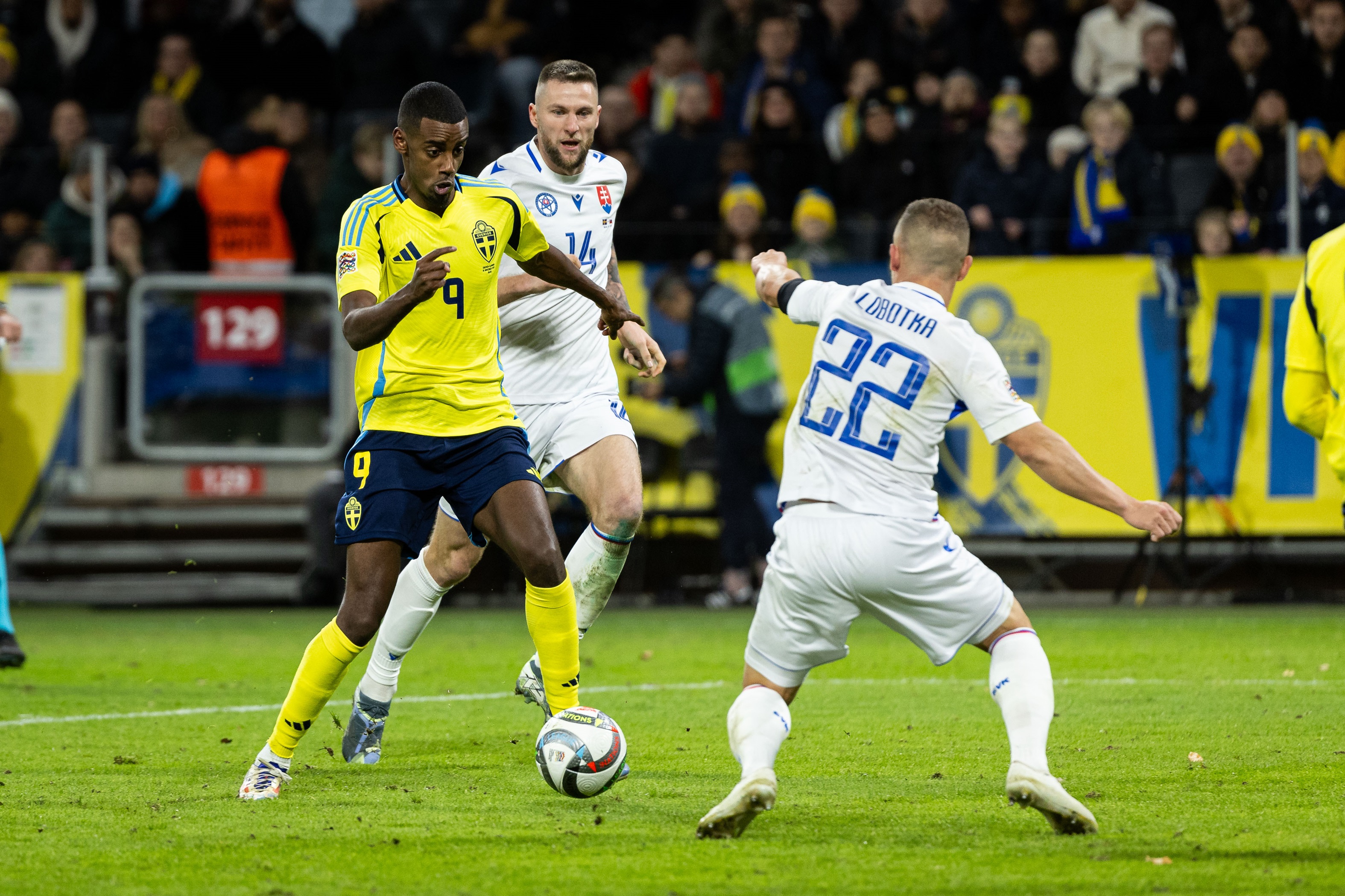 Alexander Isak dribbles with the ball for Sweden.