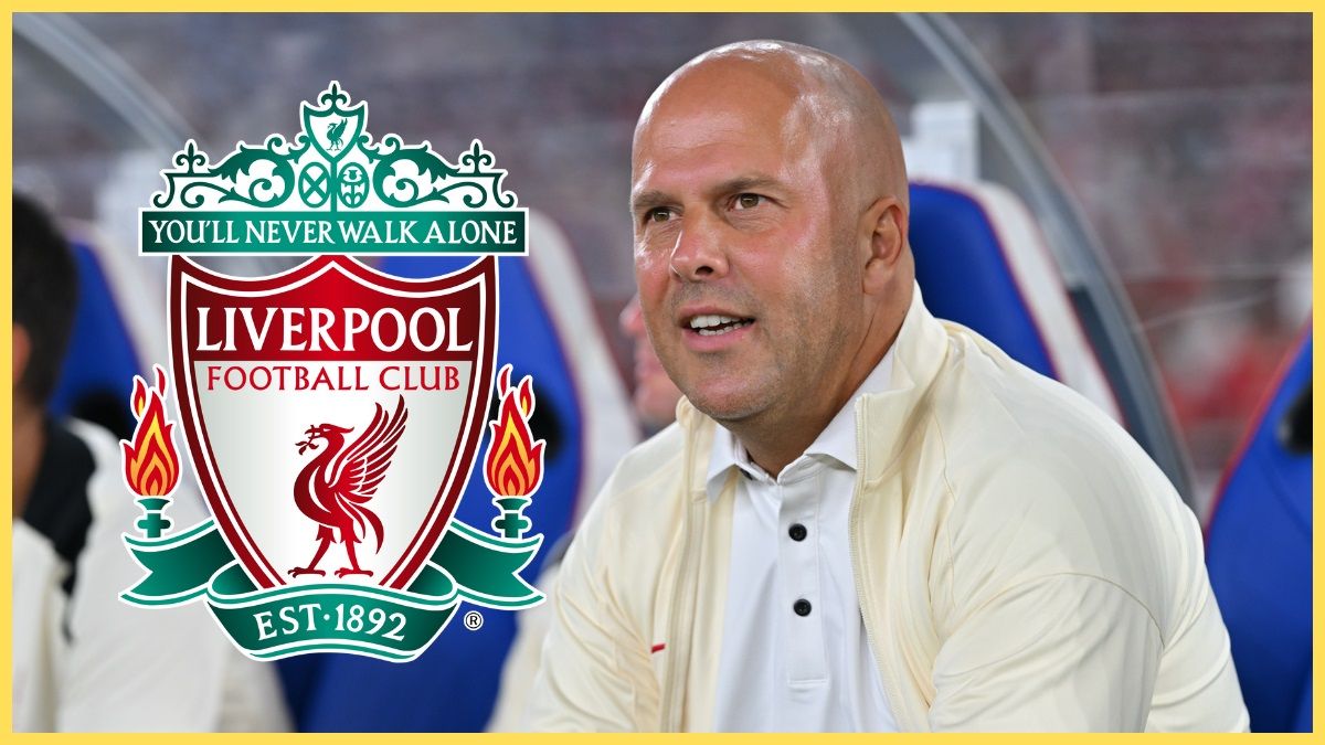 Arne Slot looks on from the bench next to Liverpool club crest.