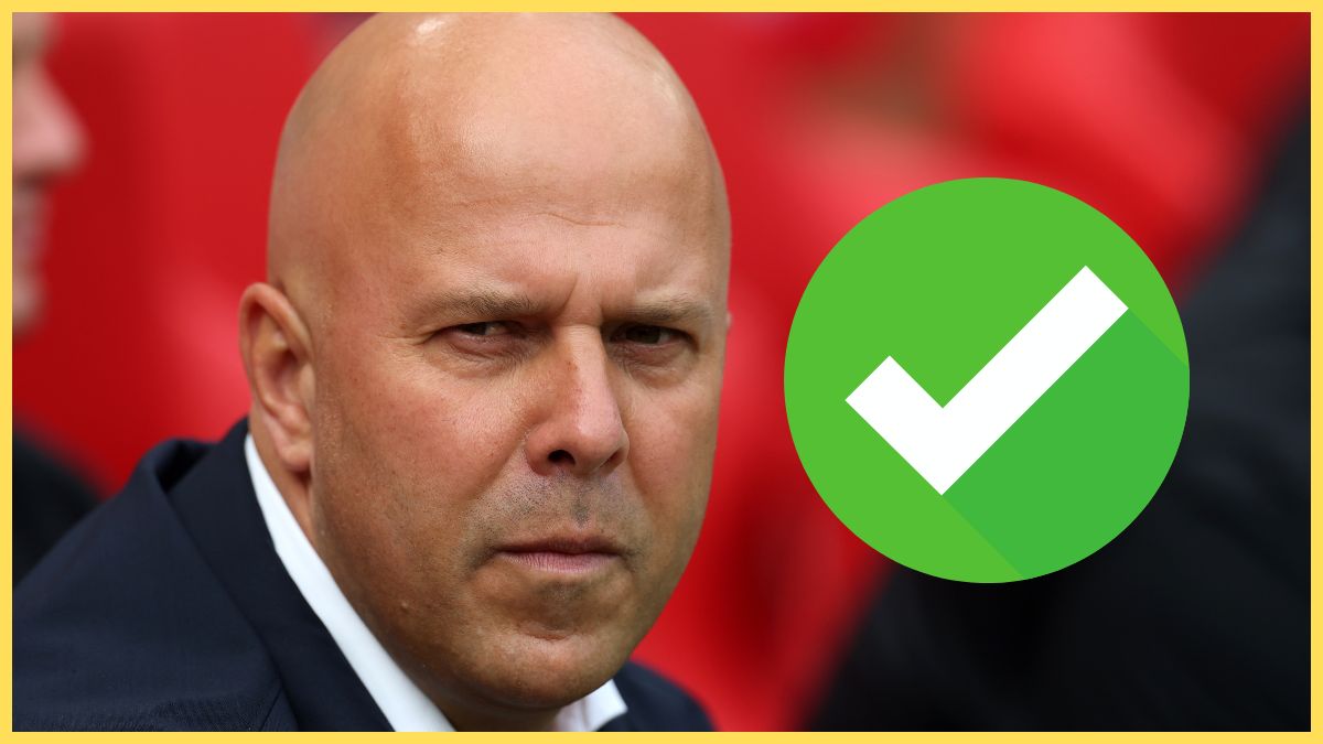 Arne Slot looks stony-faced sitting on Liverpool bench next to a tick mark.