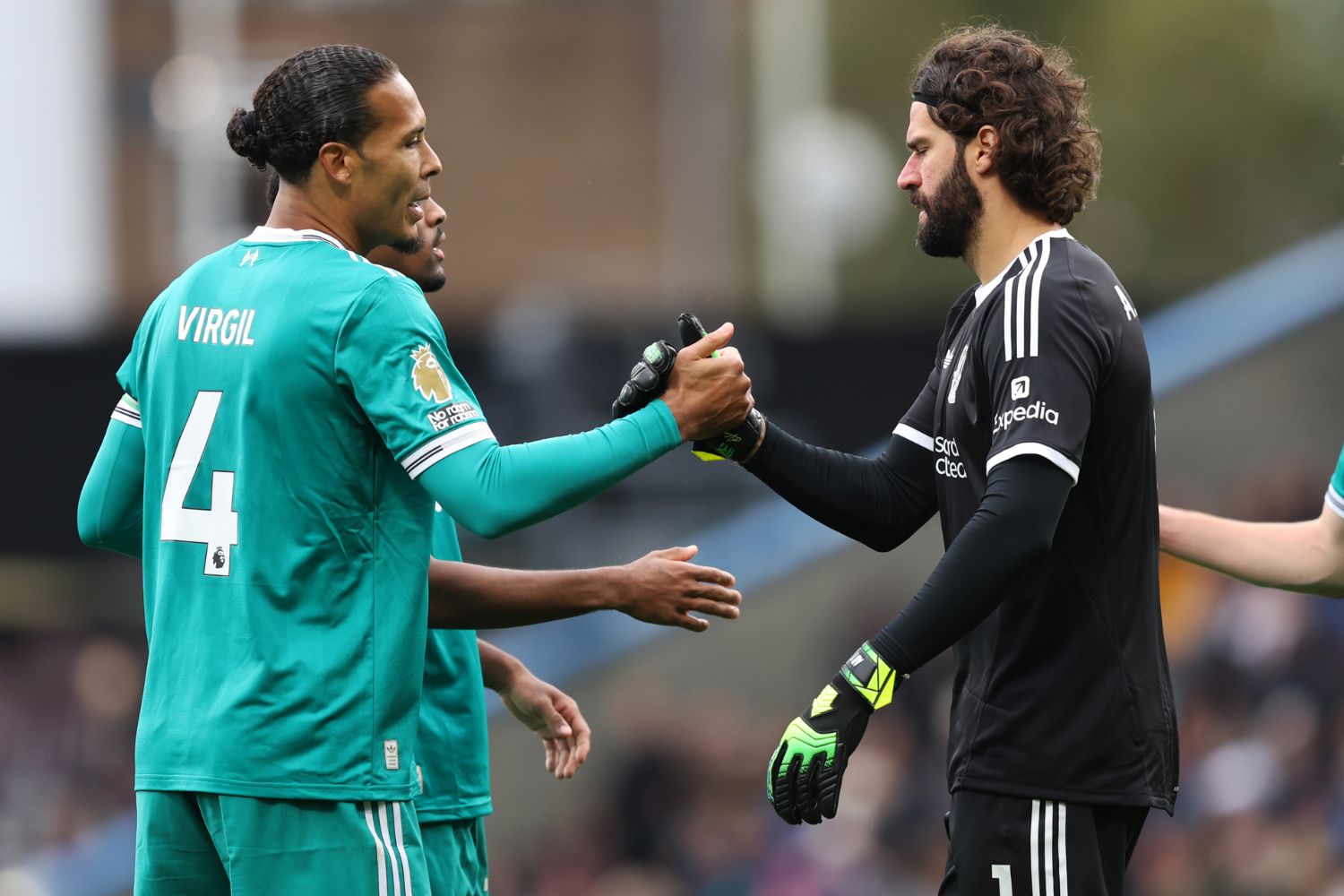 Van Dijk and Alisson after beating Burnley