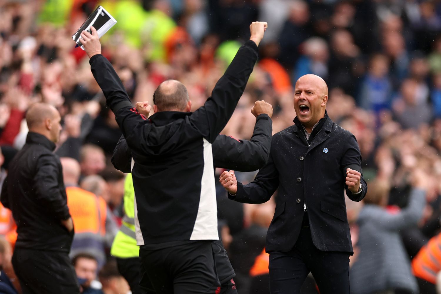 Arne Slot celebrates Liverpool scoring against Everton