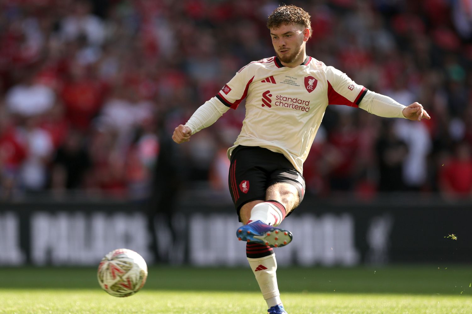 Harvey Elliott takes a penalty for Liverpool