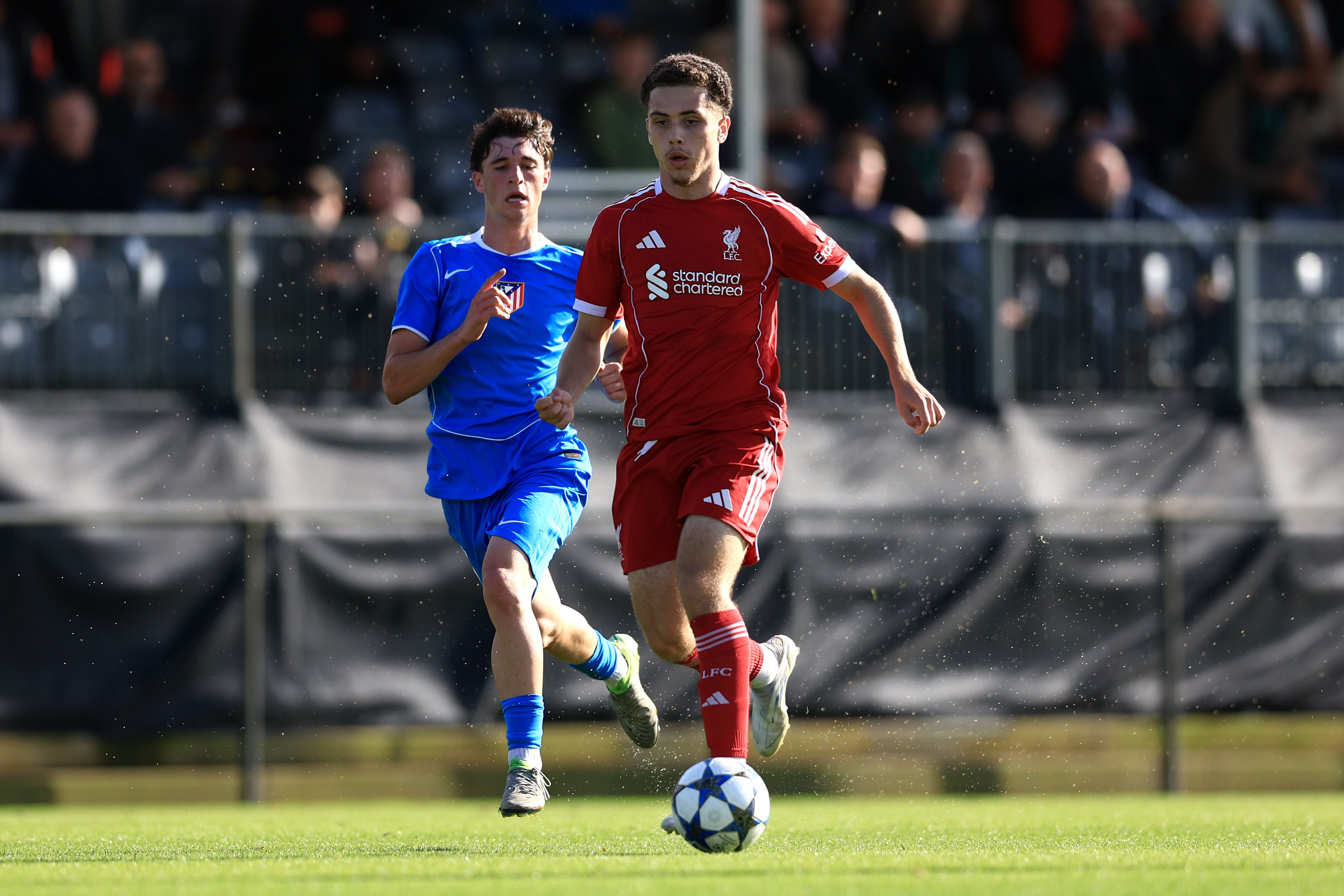 Kieran Morrison of Liverpool runs with the ball during the UEFA Youth League match between Liverpool FC and Atletico de Madrid