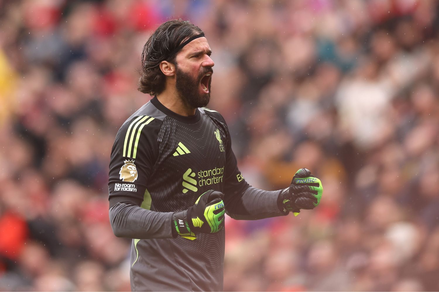 Alisson Becker of Liverpool celebrates