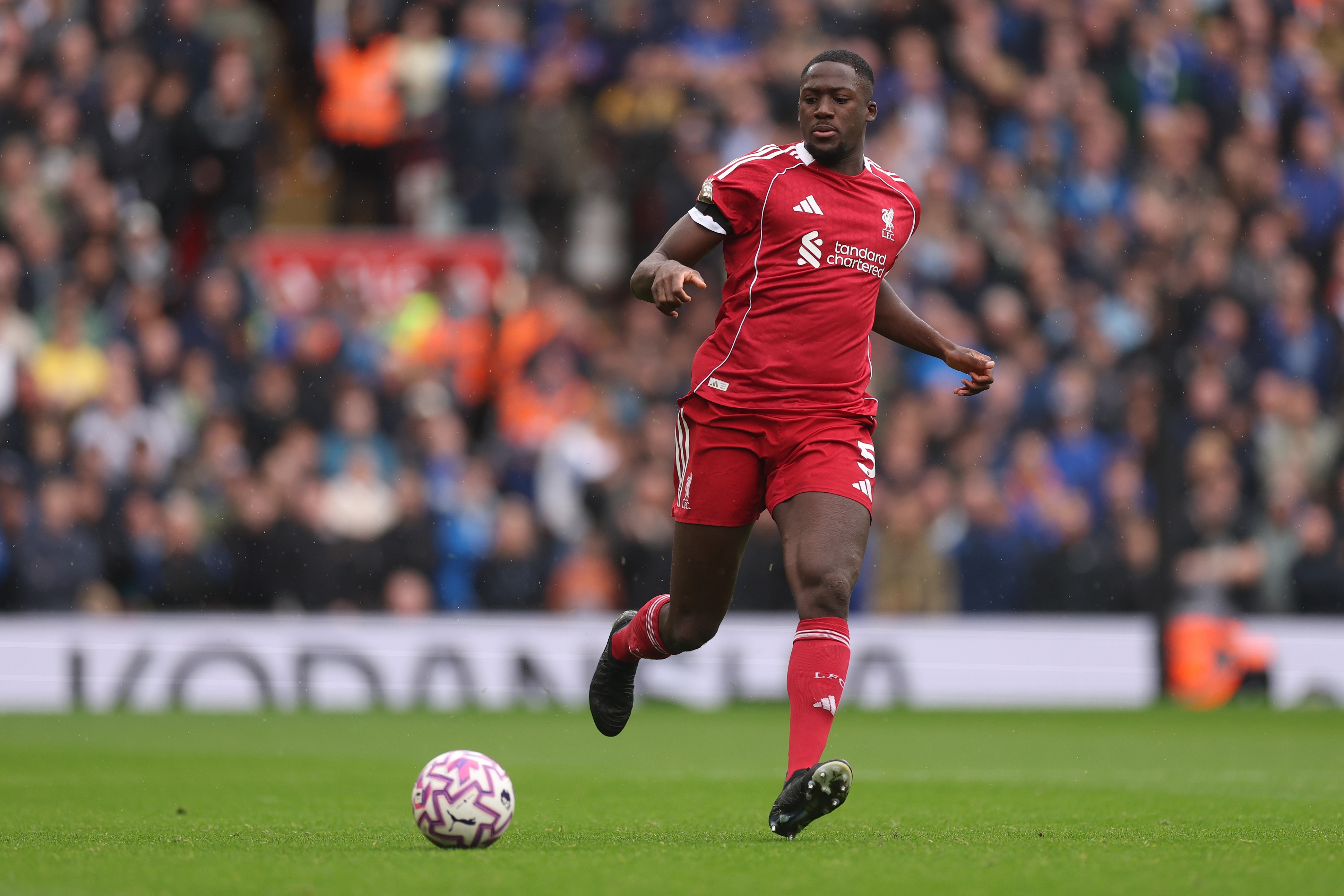 Ibrahima Konate dribbles with the ball during Liverpool game.