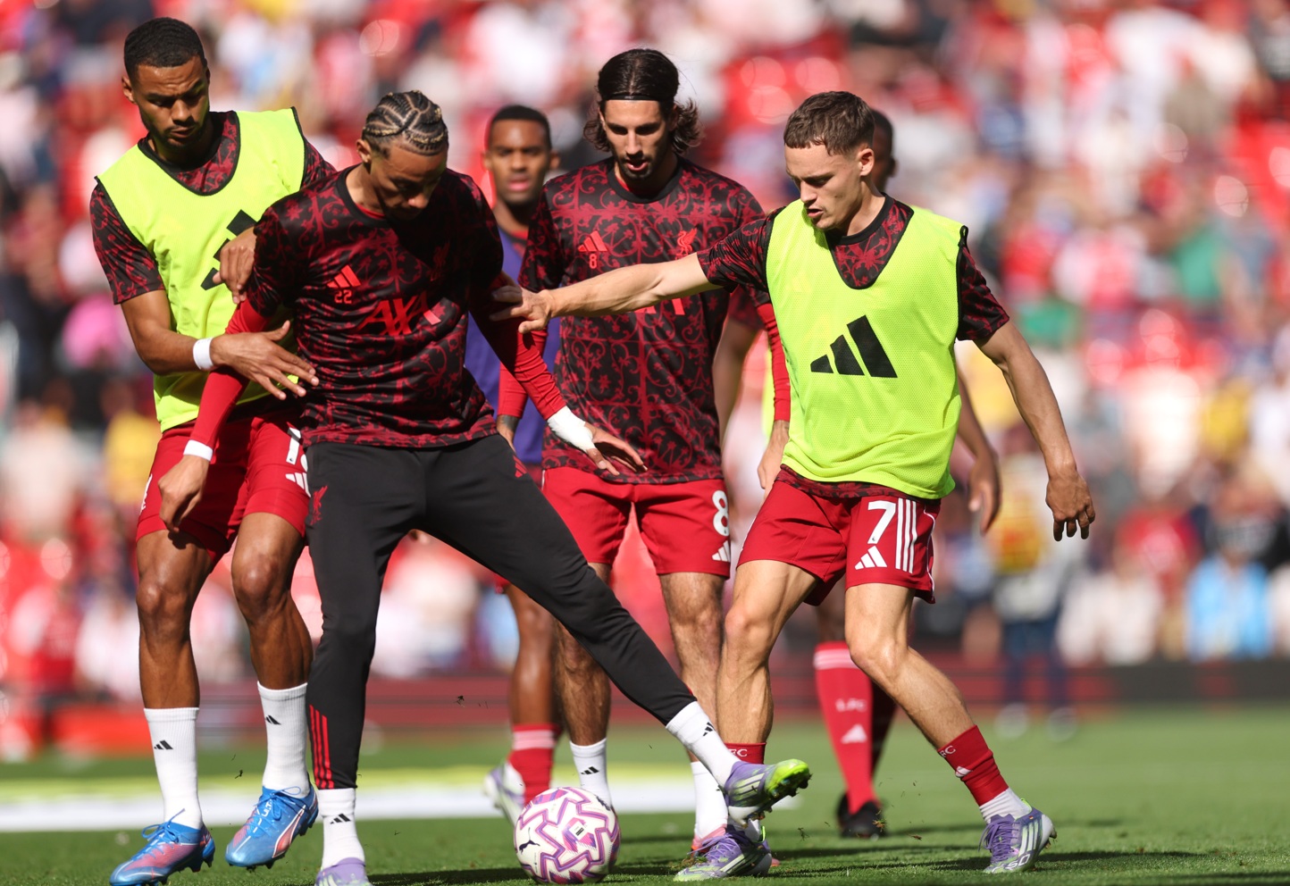 Hugo Ekitike and Florian Wirtz warm up for Liverpool