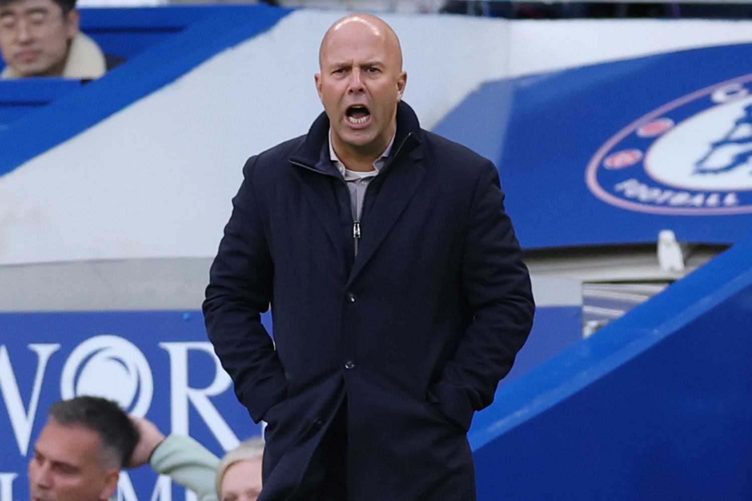 Arne Slot watches Liverpool at Chelsea