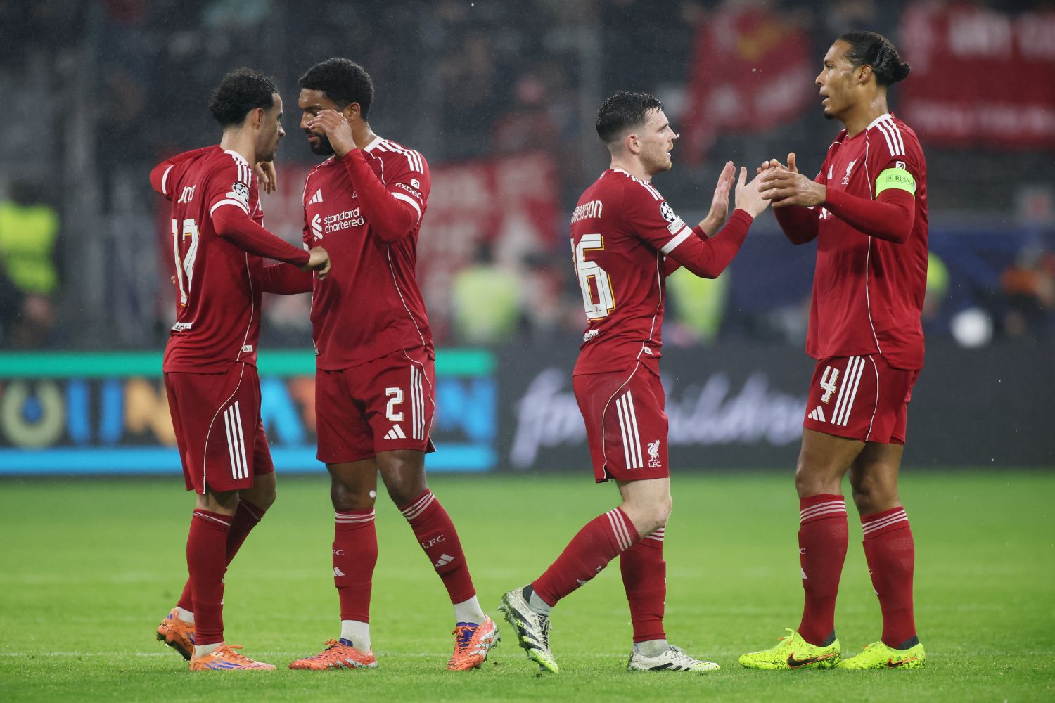 Andy Robertson, Virgil van Dijk, Curtis Jones and Joe Gomez celebrate against Eintracht Frankfurt