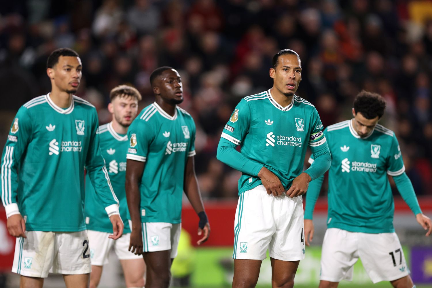 Virgil van Dijk, Ekitike, Konate, Jones and Bradley look despondent vs Brentford