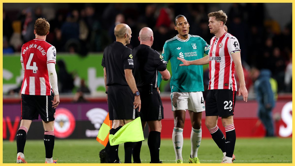 Virgil van Dijk and Nathan Collins complain to referee Simon Hooper at Brentford