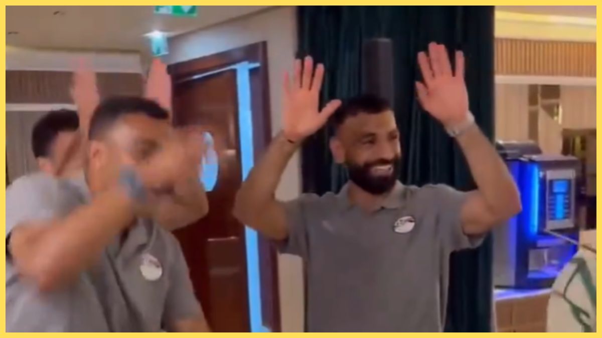 Mo Salah celebrates qualifying for the World Cup