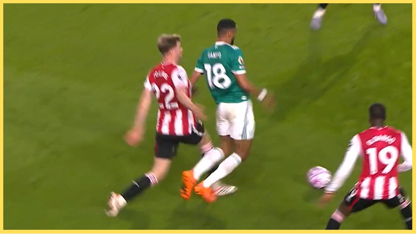 Cody Gakpo went down in the penalty area under this challenge from Nathan Collins