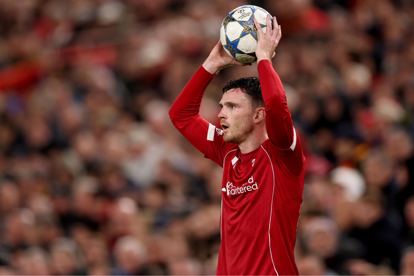 Andy Robertson takes a throw in against Real Madrid