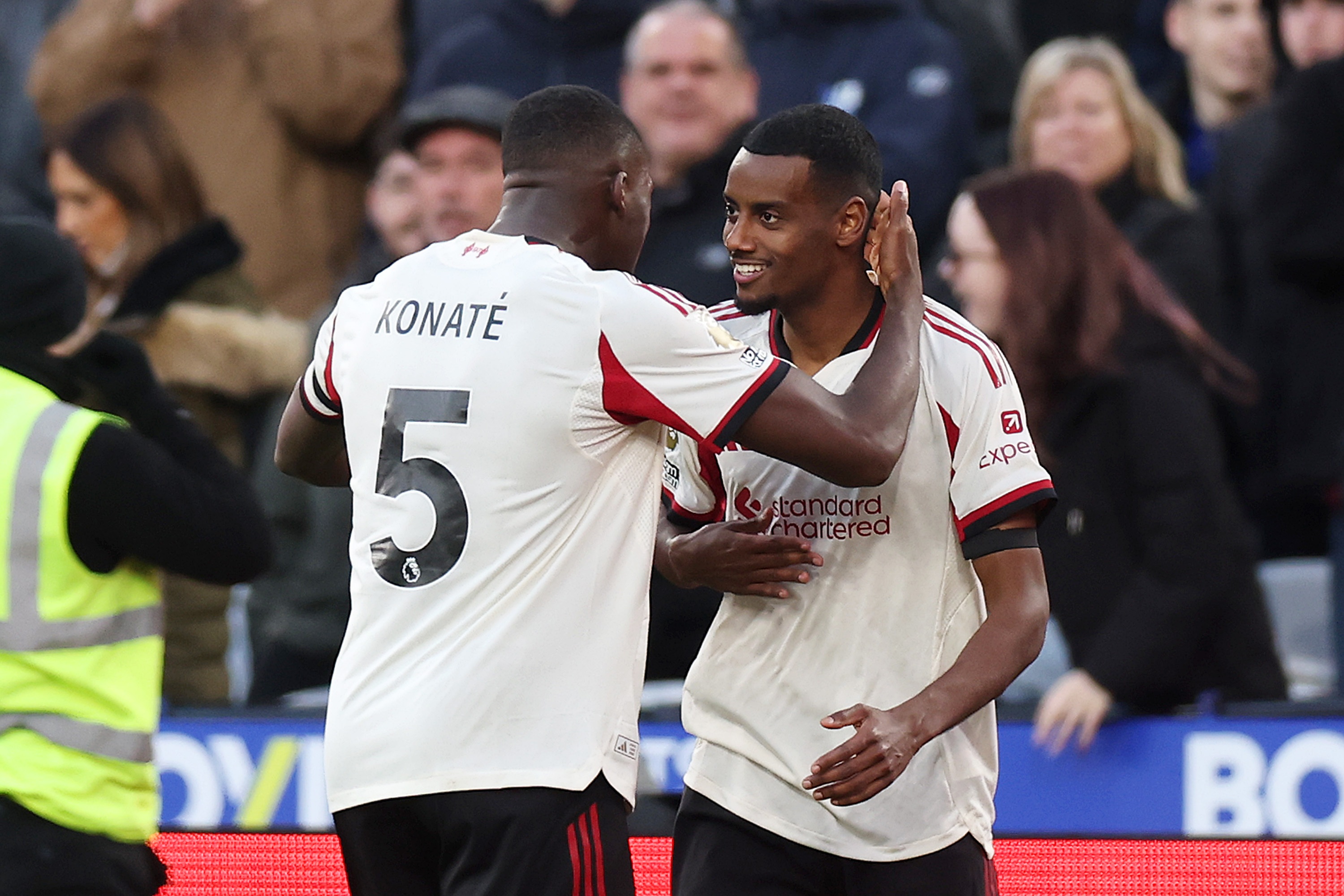 Alexander Isak celebrates with Ibrahima Konate.