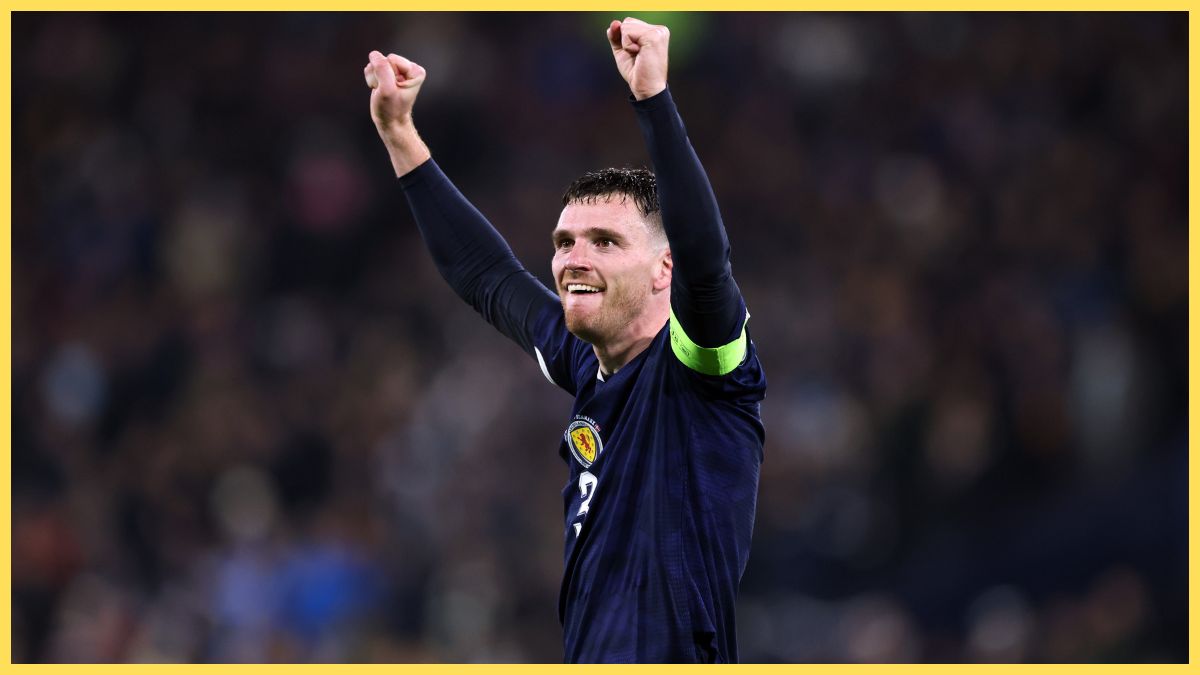 Andy Robertson celebrates qualifying for the World Cup