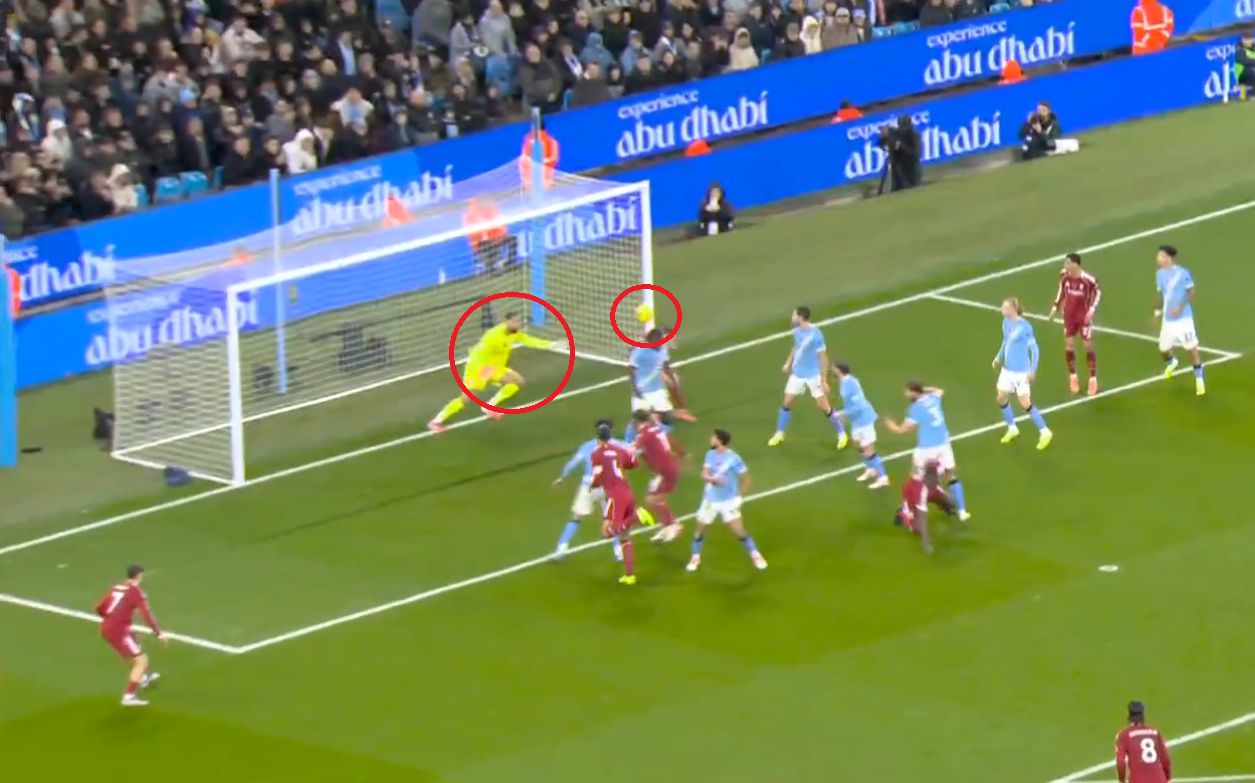 Gianluigi Donnarumma lunges to try and reach a ball heading for goal.