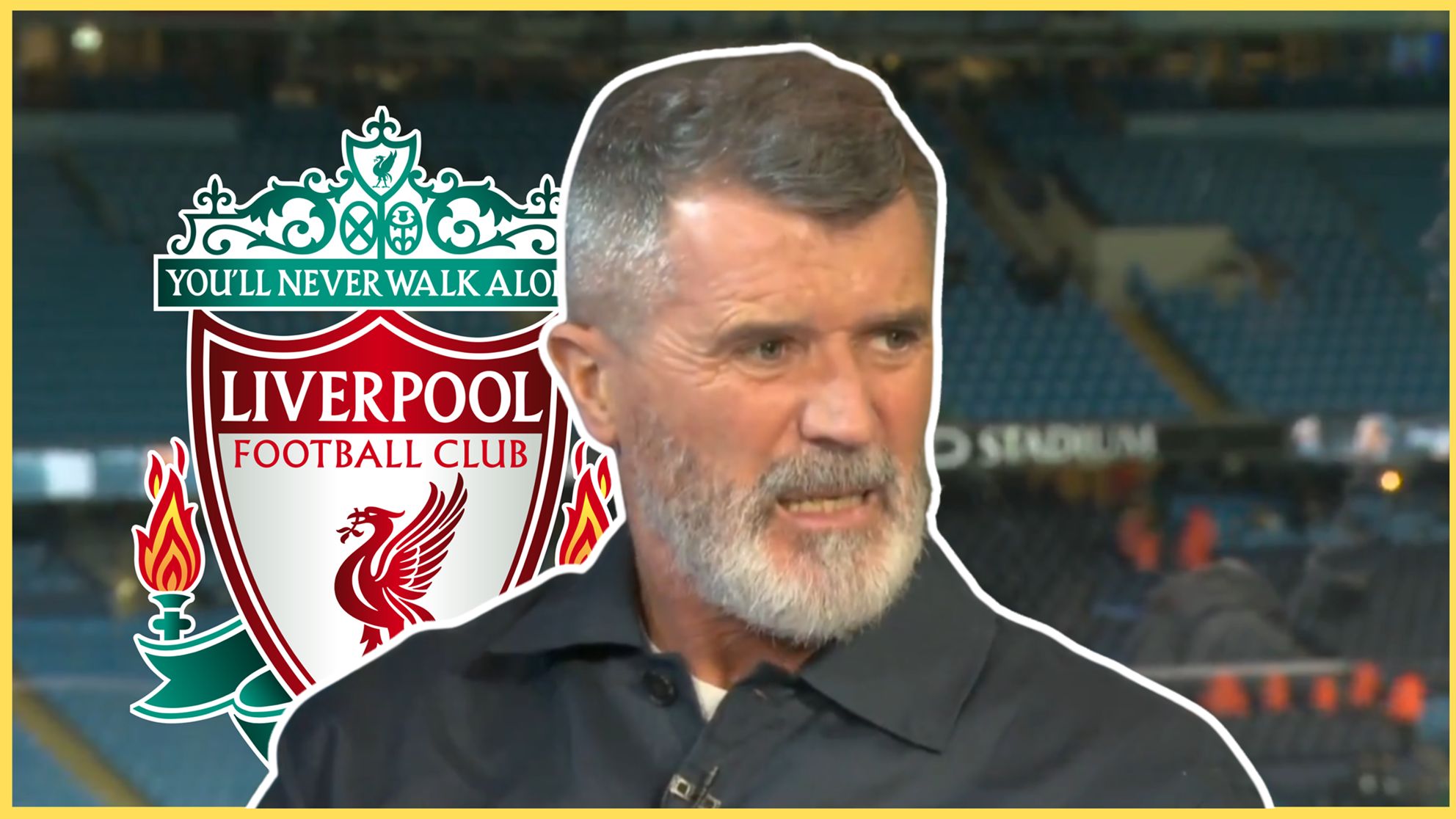Roy Keane looks annoyed in front of Liverpool club crest.