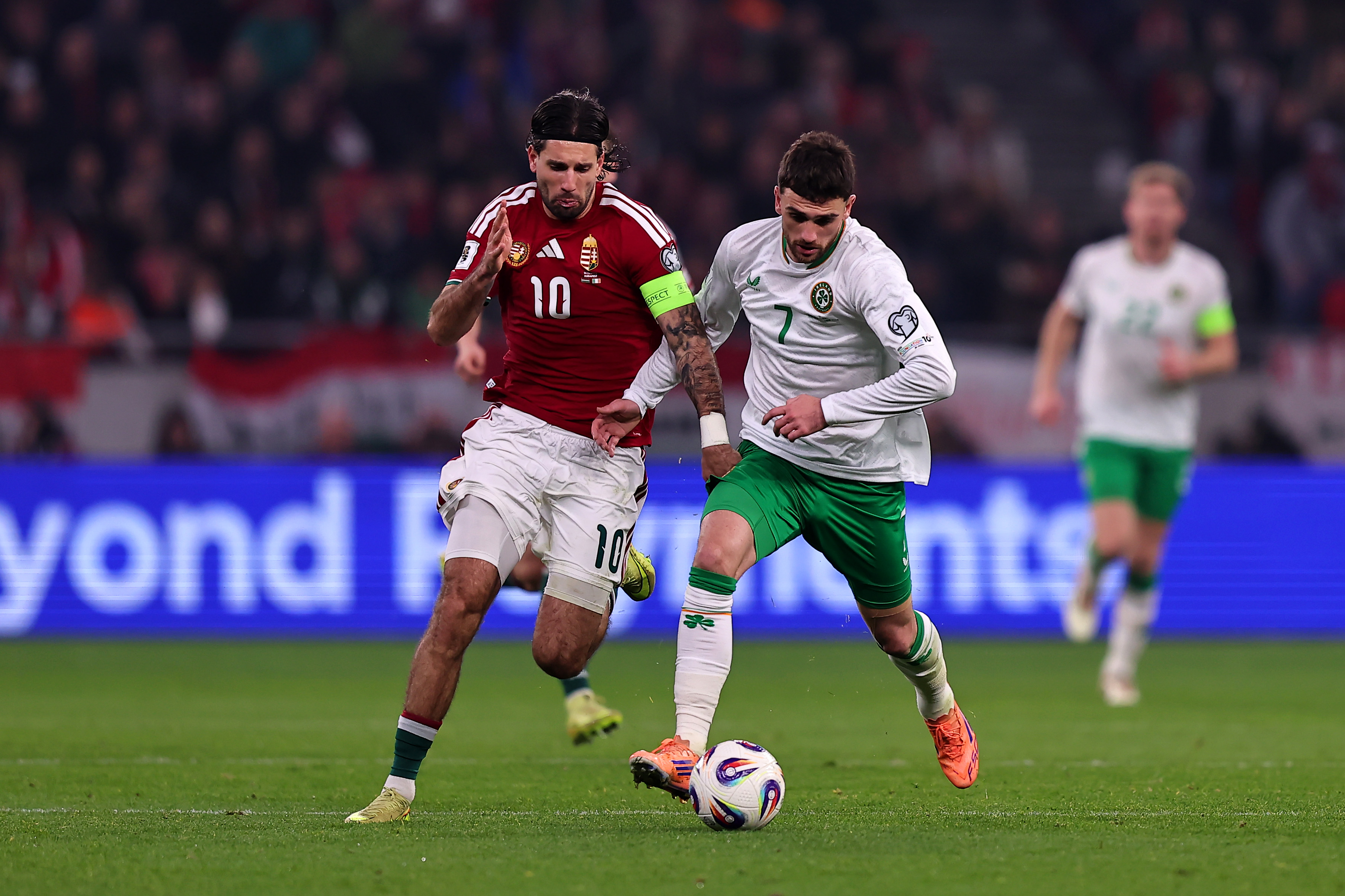 Dominik Szoboszlai challenges Troy Parrott for possession in Hungary's defeat to Ireland 