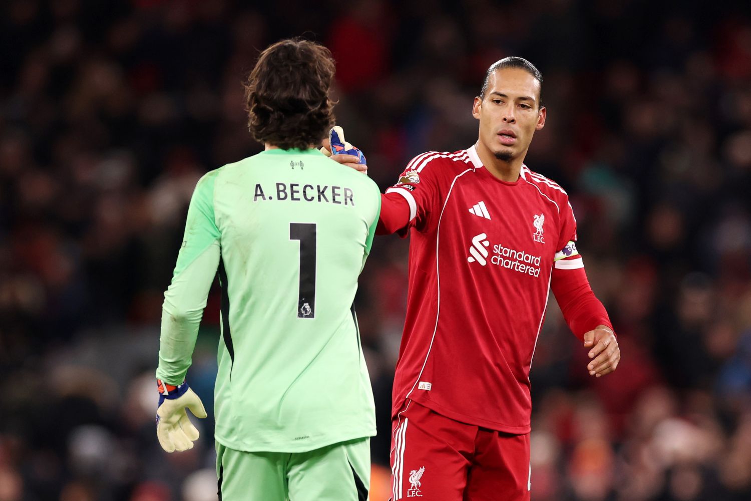 Virgil van Dijk and Alisson Becker after Liverpool beat Wolves