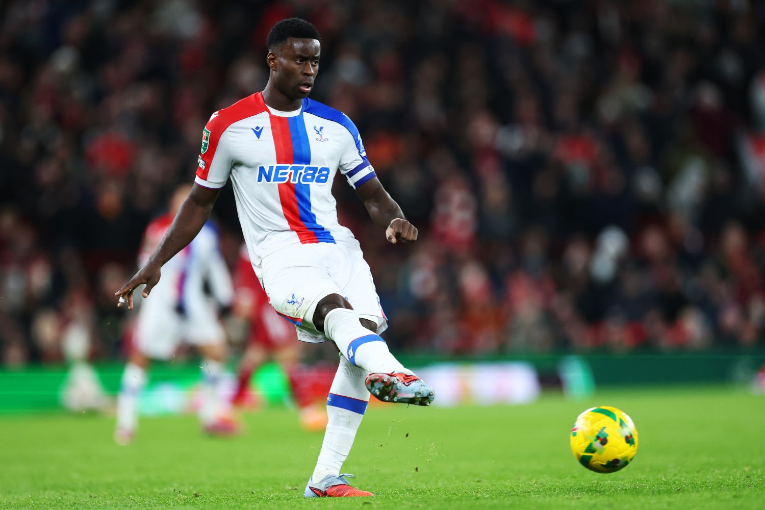 Marc Guehi plays for Crystal Palace at Anfield