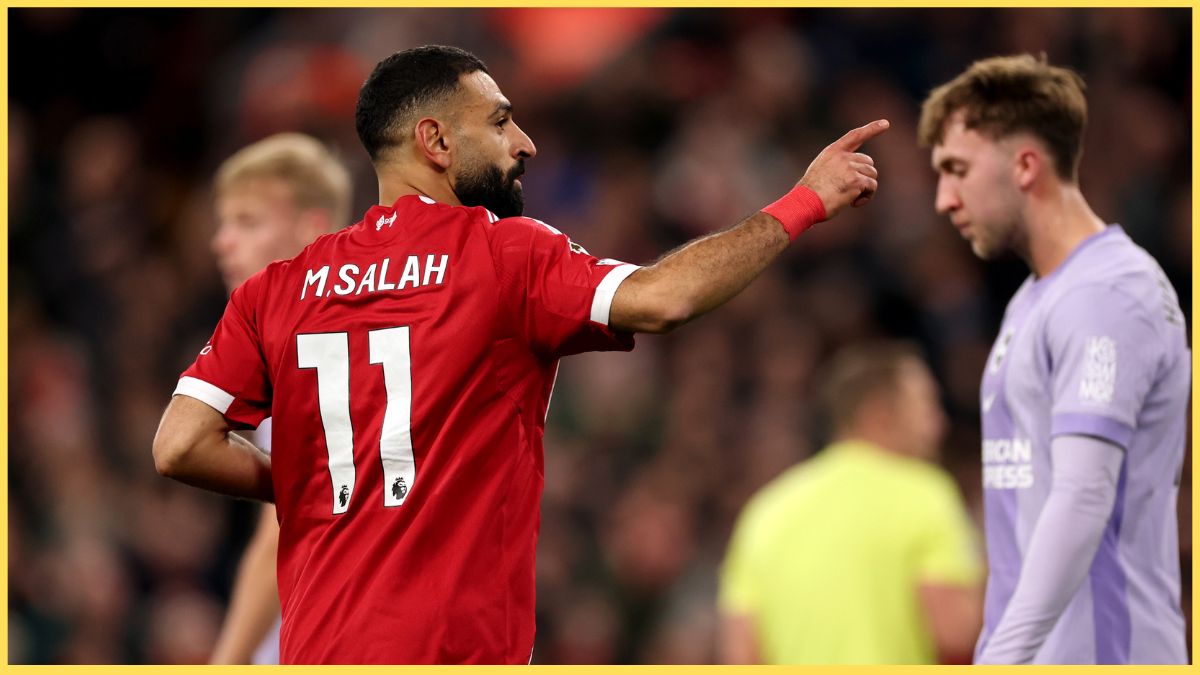 Mo Salah celebrates after Hugo Ekitike scores against Brighton