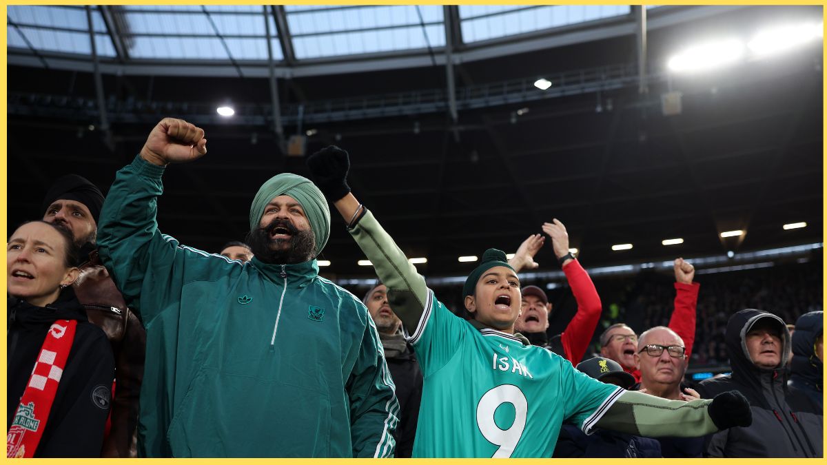 Liverpool fans celebrate against West Ham