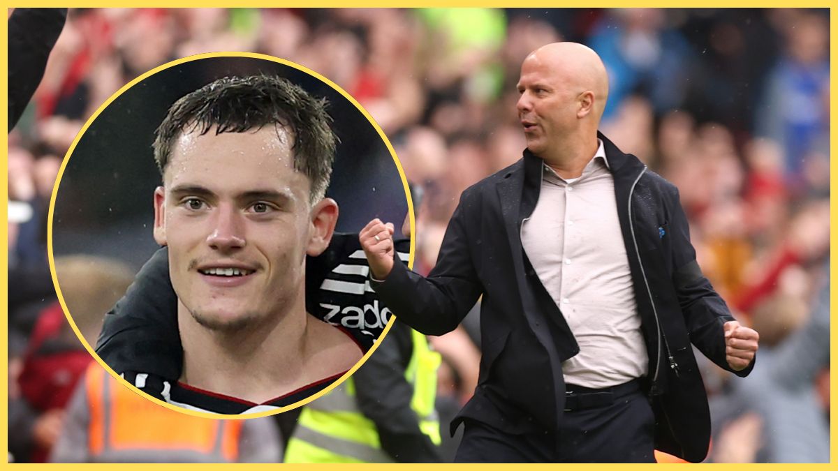 Arne Slot punches the air triumphantly next to a smiling Florian Wirtz.