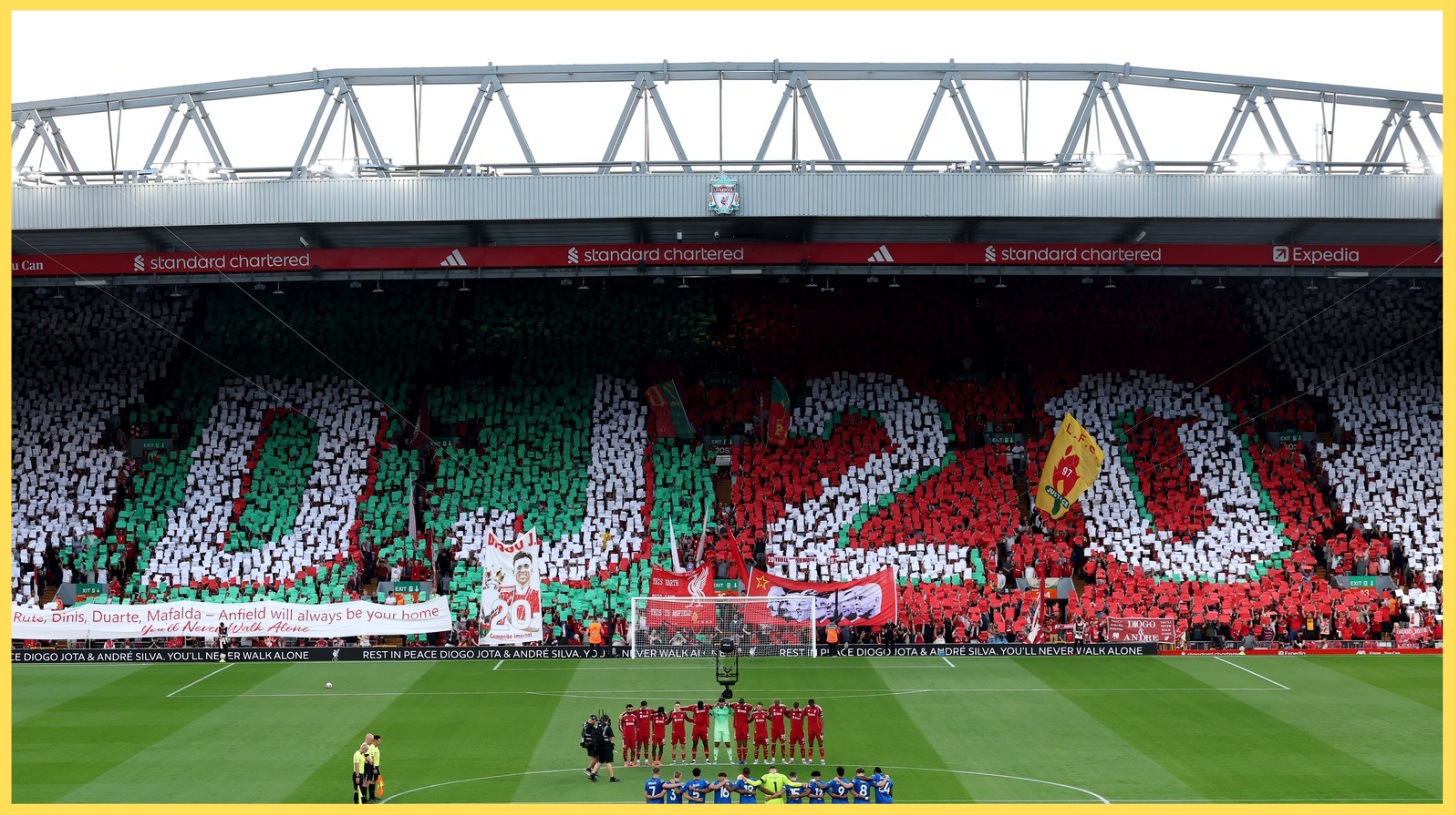 Supporters at Anfield hold up a mosaic in tribute to Diogo Jota