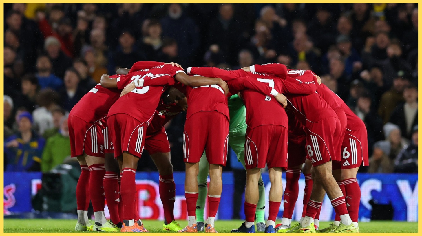Liverpool players form a huddle before their match against Leeds