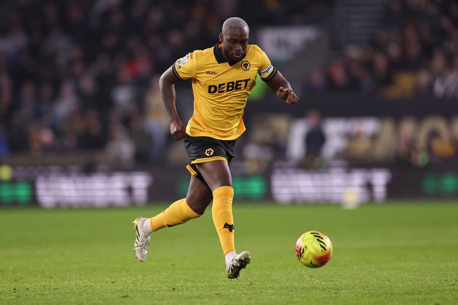 Wolves defender Toti Gomes will miss his team's upcoming visit to Anfield