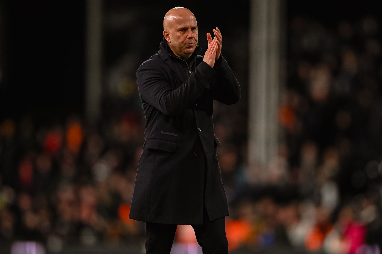 Arne Slot applauds Liverpool fans at Fulham