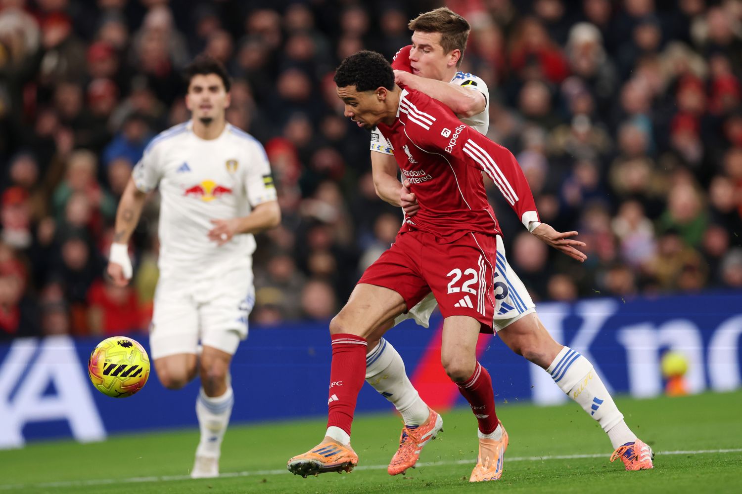 Hugo Ekitike of Liverpool is challenged by Jaka Bijol of Leeds United