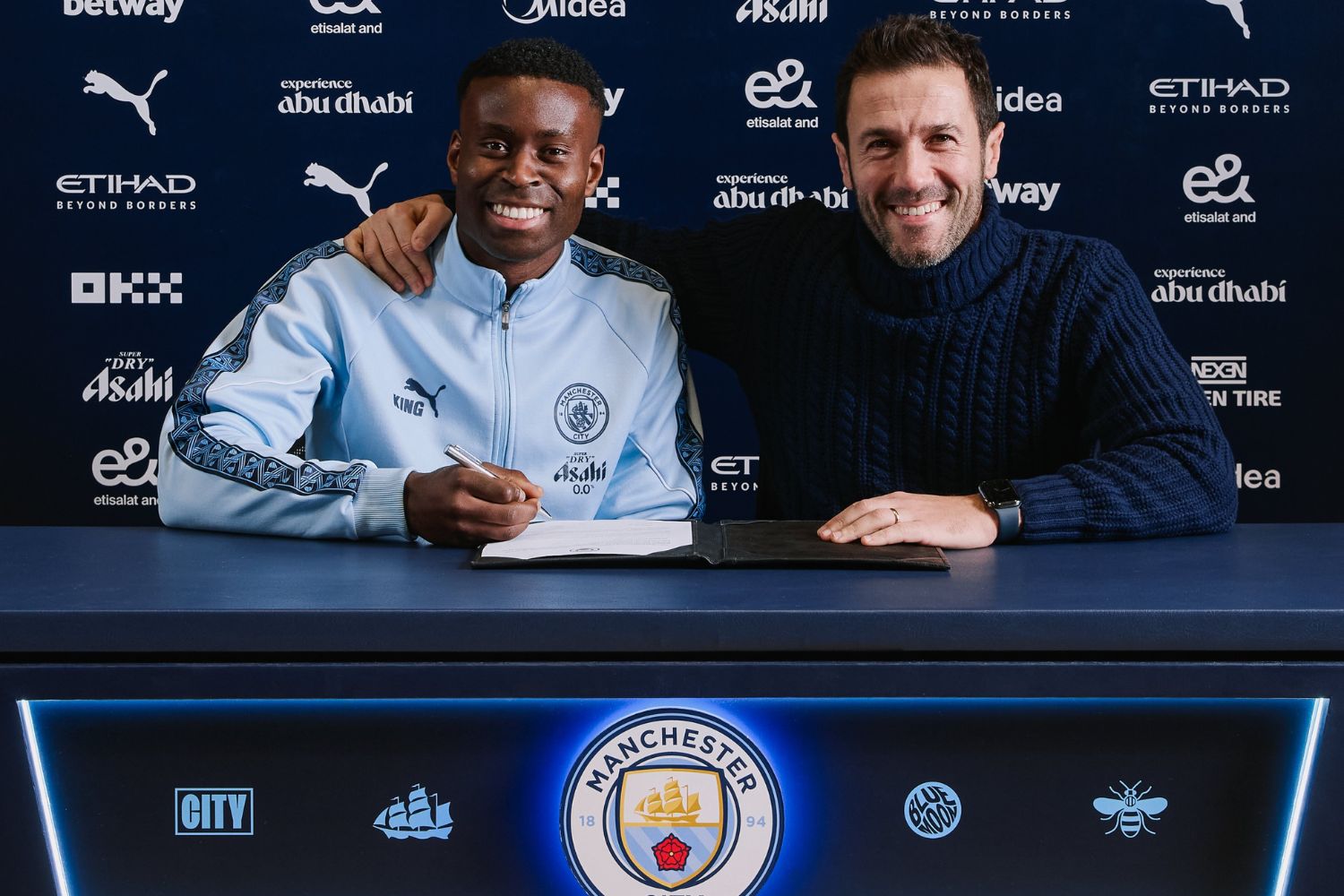 Marc Guehi poses as a Manchester City player