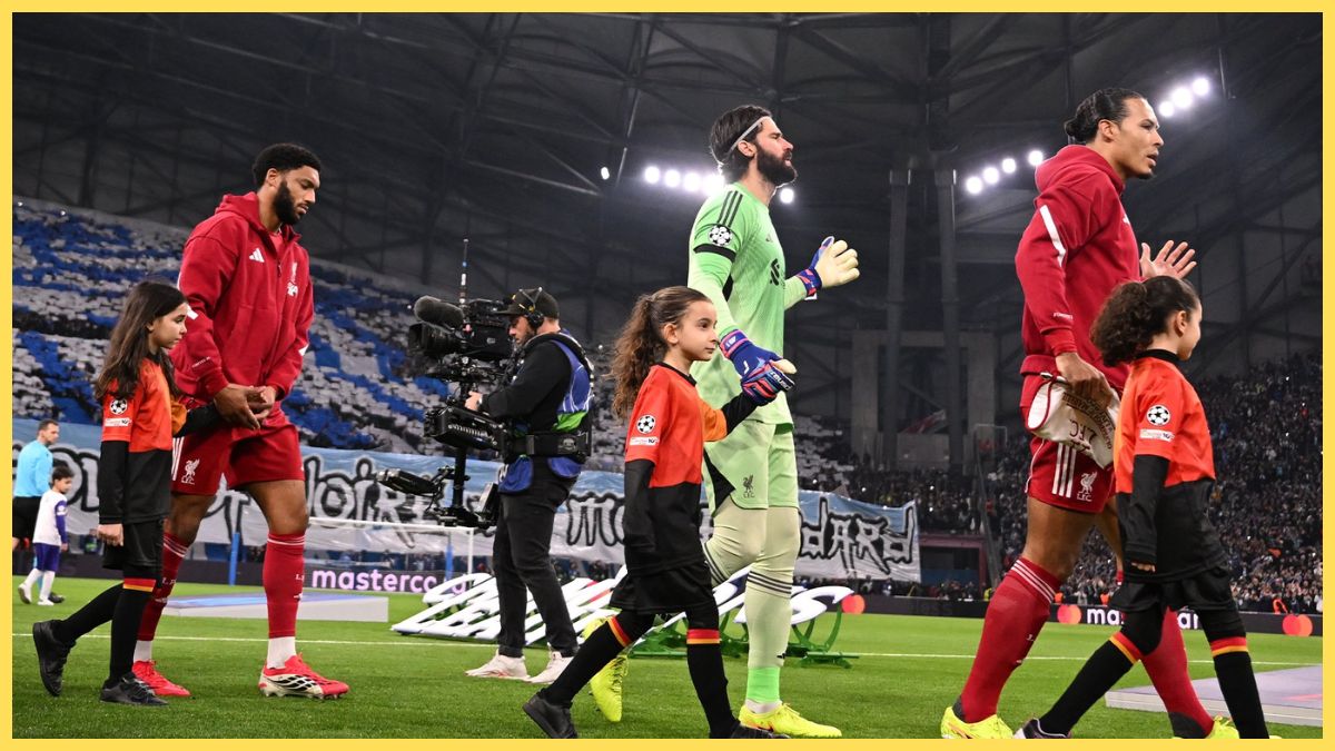 Joe Gomez, Alisson and Virgil van Dijk walk out against Marseille